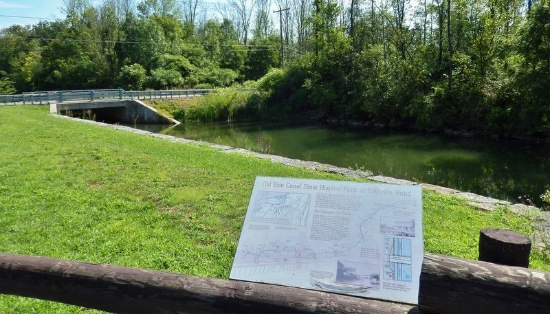 Old Erie Canal Marker  <i>wide view<br>(Old Erie Canal / Pool's Brook in background)</i> image. Click for full size.