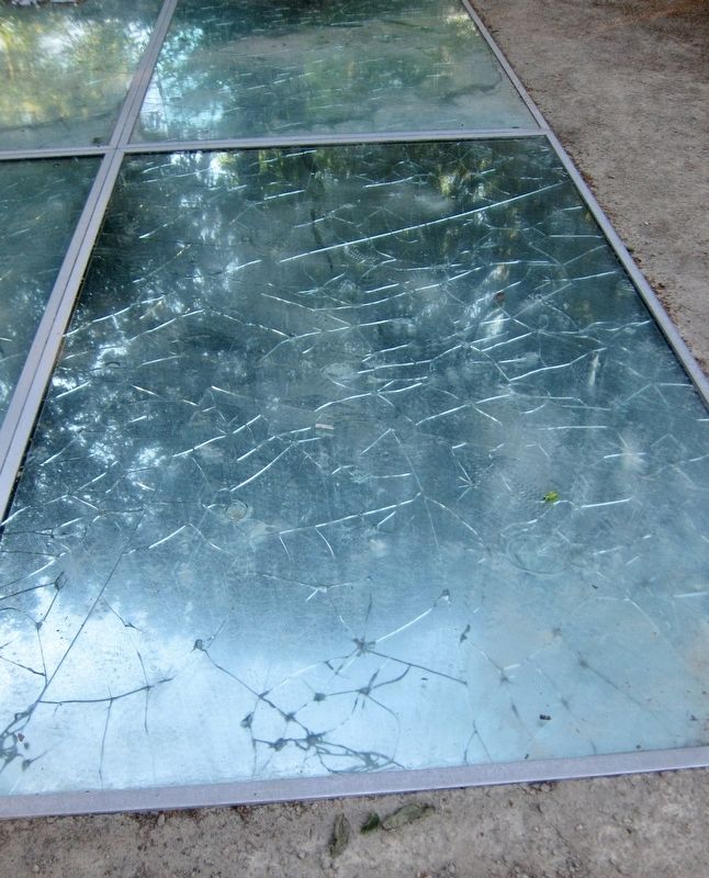Auschwitz Monument (Mirror Monument) - broken mirror closeup image. Click for full size.