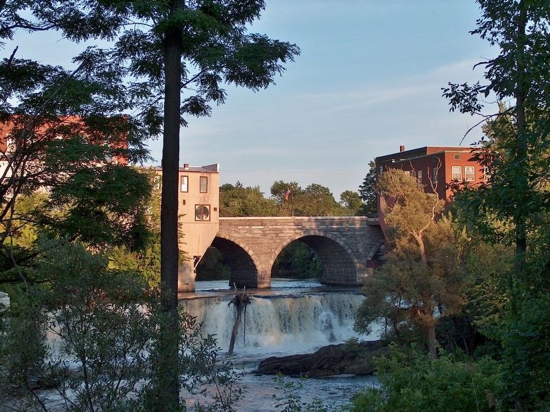 Otter Creek Bridge & Waterfall<br>(<i>view from Riverfront Park</i>). Click for full size. Otter Creek Bridge & Waterfall<br>(<i>view from Riverfront Park</i>) image. Click for full size.