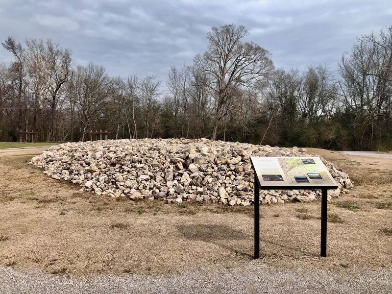 The reconstructed stone mound. image. Click for full size.