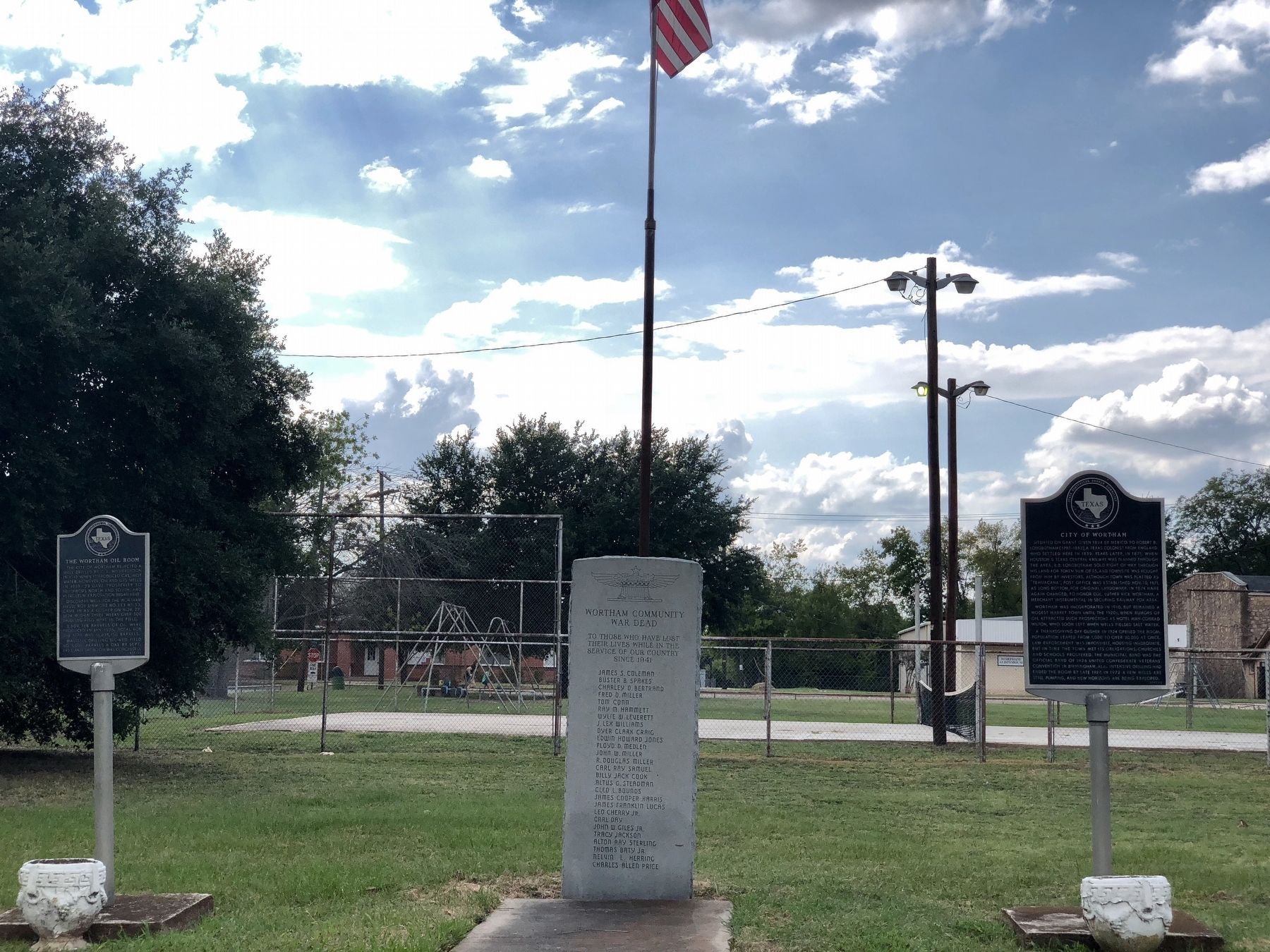 The Wortham Oil Boom Marker, left, along with the City of Wortham marker image. Click for full size.