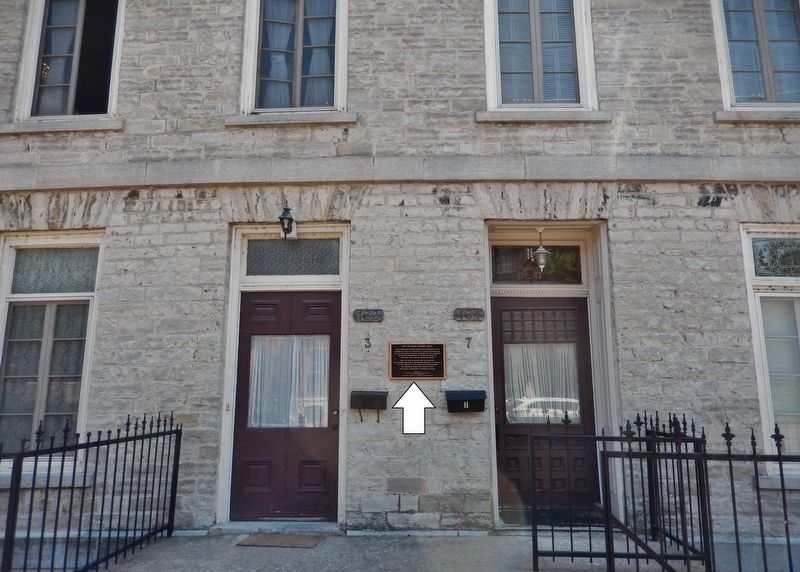 133 131 King Street East Marker • <i>wide view<br>(marker visible between doors)</i> image, Touch for more information