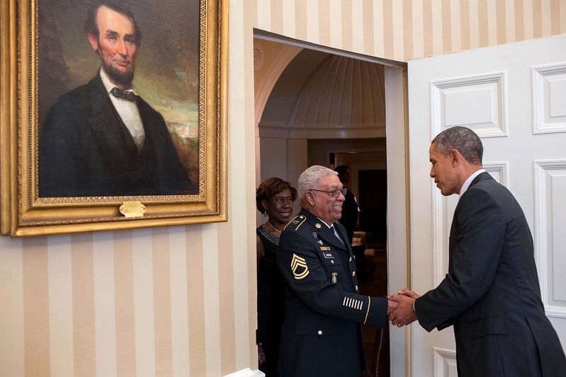 <i>President Barack Obama Greets Medal of Honor Recipient Staff Sergeant Melvin Morris...</i> image. Click for full size.