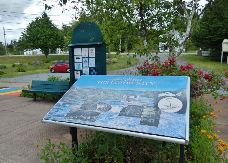 The Community Marker � <i>wide view<br>(Nova Scotia Trunk Highway 7 in background)</i> image. Click for full size.