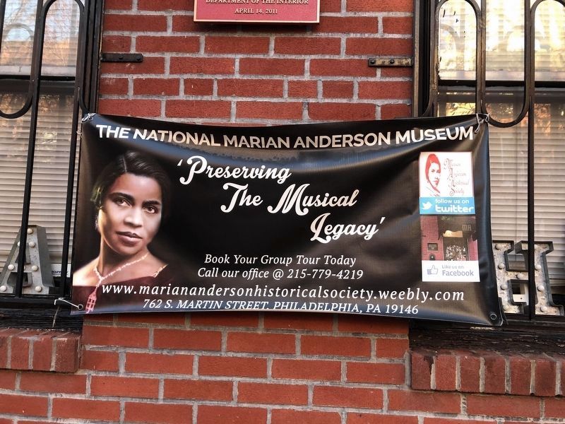 Banner on the wall of the museum image. Click for full size.