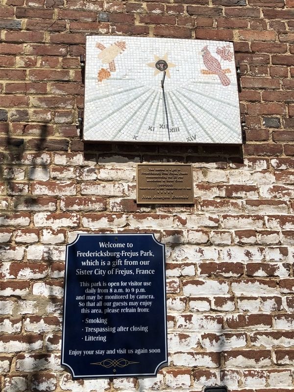 Additional plaques on the nearby building image. Click for full size.