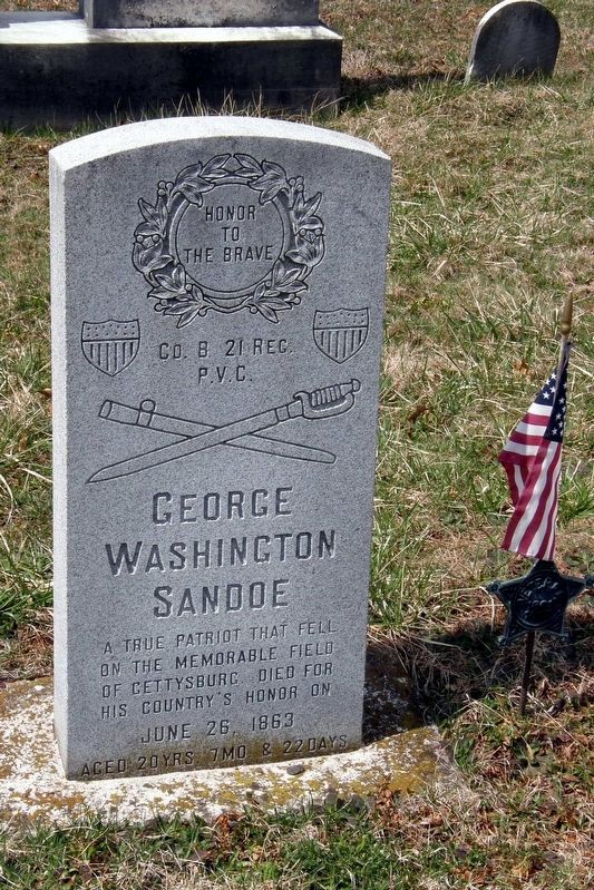 The replacement headstone of George Washington Sandoe at the Mount Joy Lutheran Church. image. Click for full size.