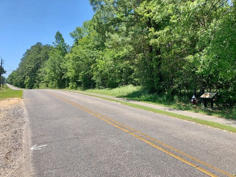 Looking west on Old Military Road with the marker on right. image. Click for full size.
