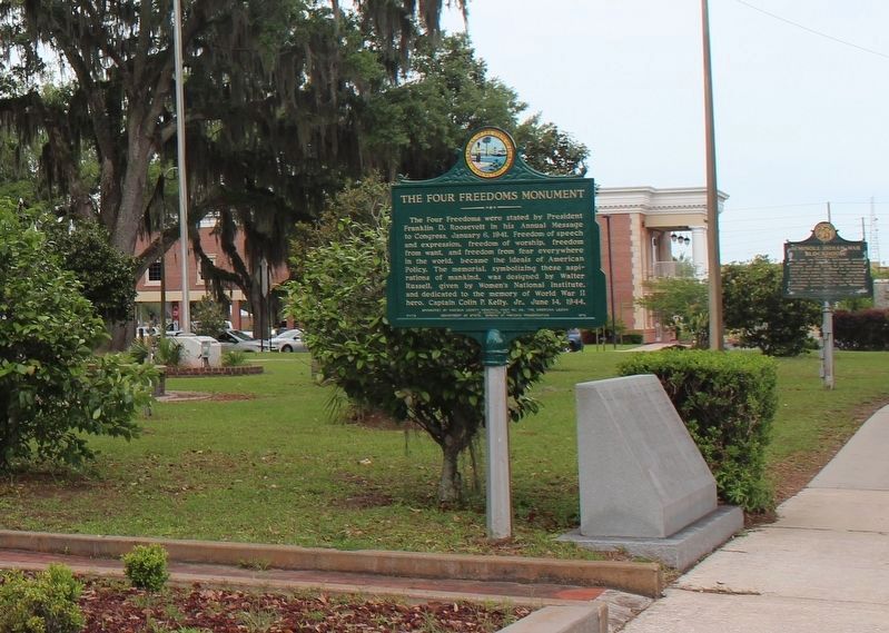 Seminole Indian War Blockhouse Marker in background with Four Freedoms Monument Marker in foreground image. Click for full size.