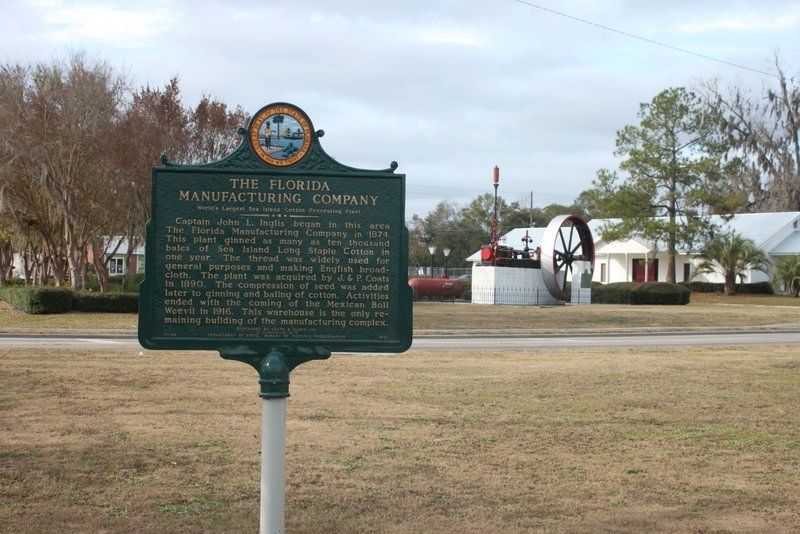 The Florida Manufacturing Company Marker with the steam engine in the background image. Click for full size.