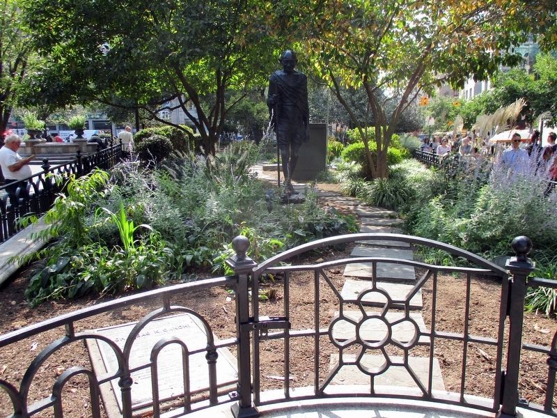 Mohandas K. Gandhi plaque and statue in Gandhi Gardens. Click for full size. Mohandas K. Gandhi plaque and statue in Gandhi Gardens image. Click for full size.