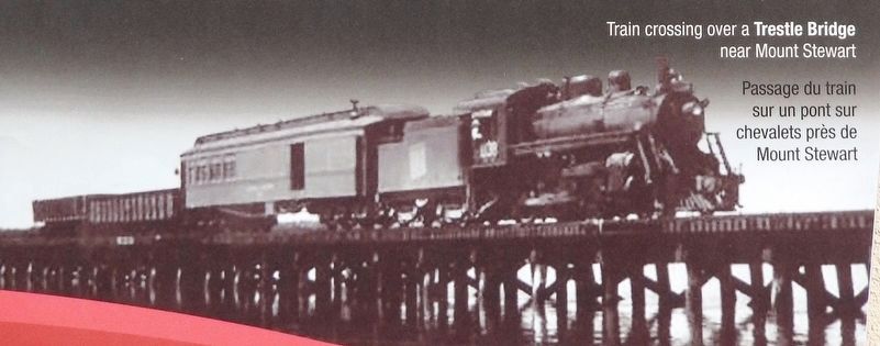 Marker detail: Train crossing over a Trestle Bridge near Mount Stewart. Click for full size. Marker detail: Train crossing over a Trestle Bridge near Mount Stewart image. Click for full size.