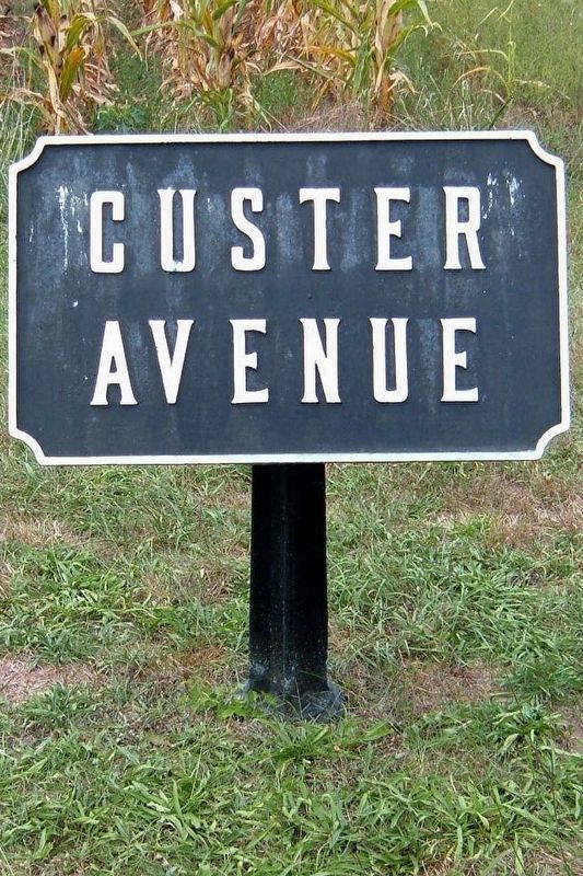 Custer Avenue iron sign image. Click for full size.