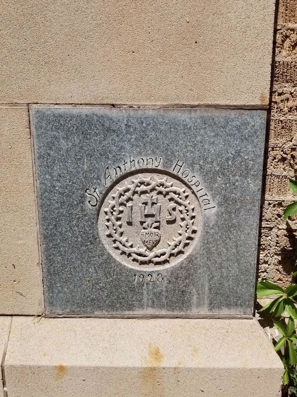 St. Anthony's Hospital 1928 marker stone on the east side of the building image. Click for full size.