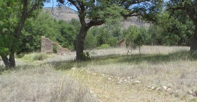 Camp Commissary wall and Bakery are in the background.. Click for full size. Camp Commissary wall and Bakery are in the background. image. Click for full size.