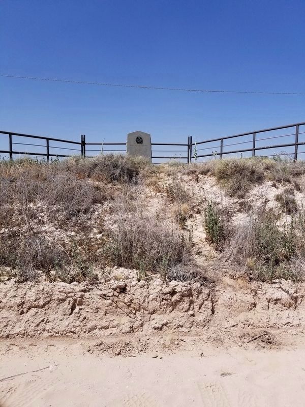 The Marker is above the road on a little rise. Click for full size. The Marker is above the road on a little rise image. Click for full size.