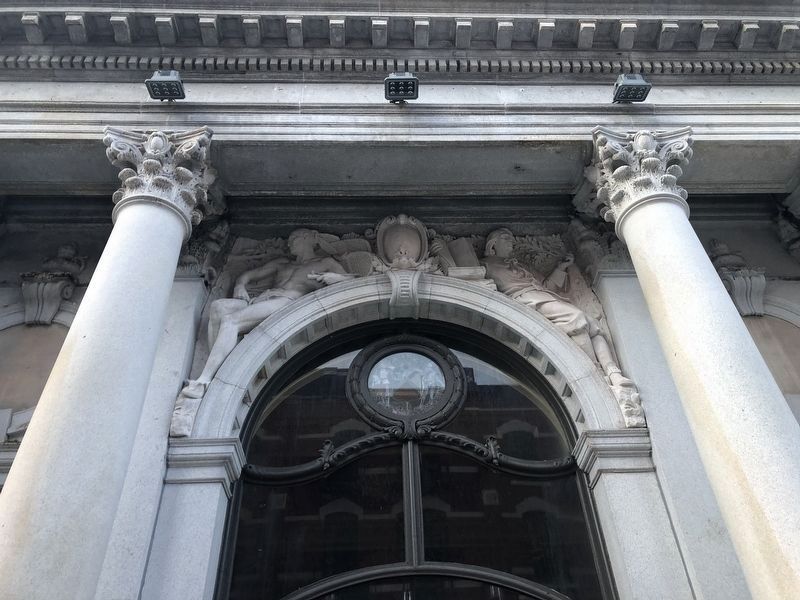 Close up of architectural detail above the doorway image. Click for full size.