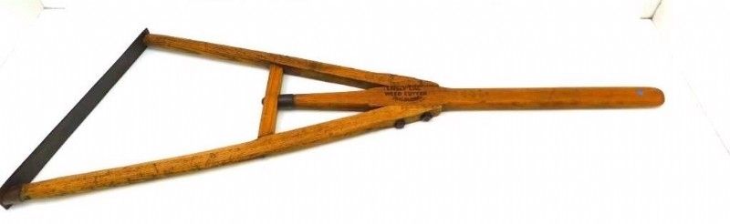 Antique "Lively Lad" weed cutter image. Click for full size.