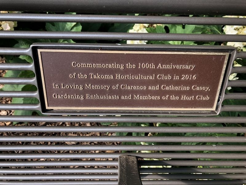 Dedication plaque on the bench in the park image. Click for full size.
