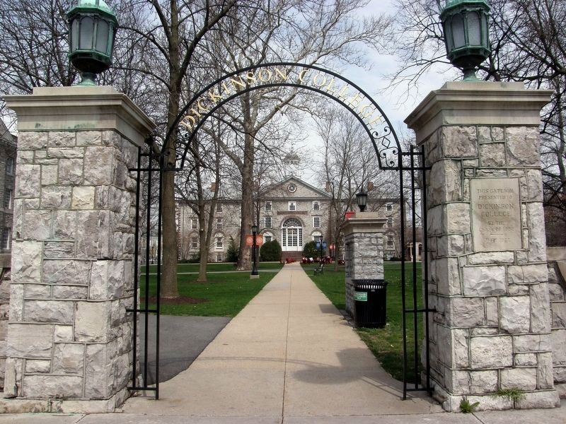 Old West through a college gate. image. Click for full size.