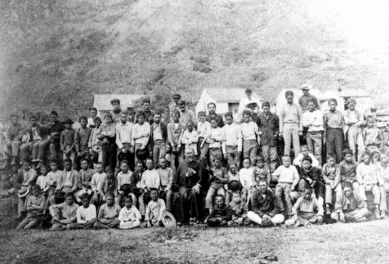 Father Damien and his flock, two weeks before his death. Click for full size. Father Damien and his flock, two weeks before his death image. Click for full size.