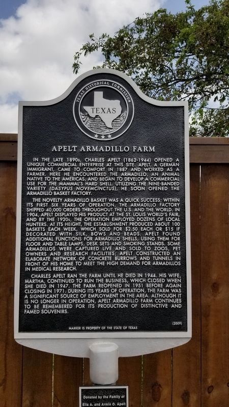 Apelt Armadillo Farm Marker with new fence image. Click for full size.