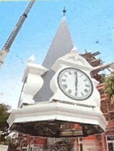 (Right Side Top Left): Clock Steeple being raised back atop City Hall Building image. Click for full size.