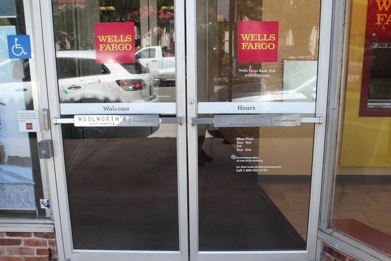 Woolworth Push Plates still on the door now housed by Wells Fargo image. Click for full size.