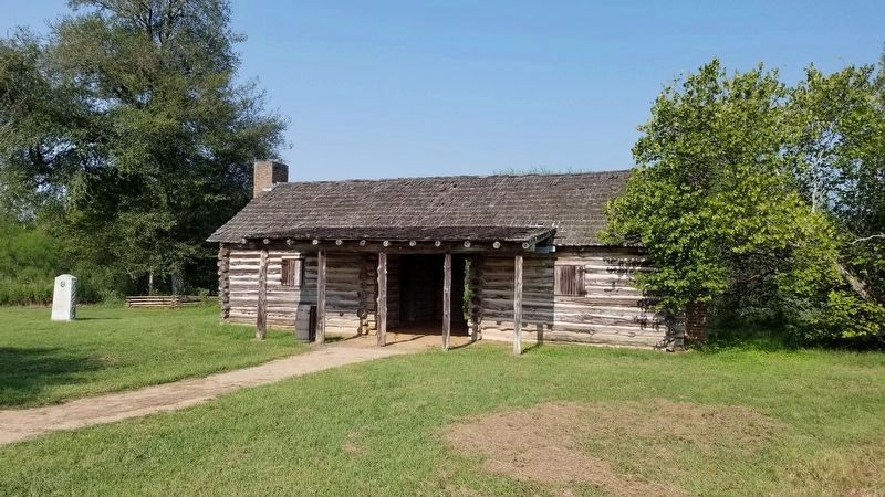 A Town Hall Marker and cabin. Click for full size. A Town Hall Marker and cabin image. Click for full size.