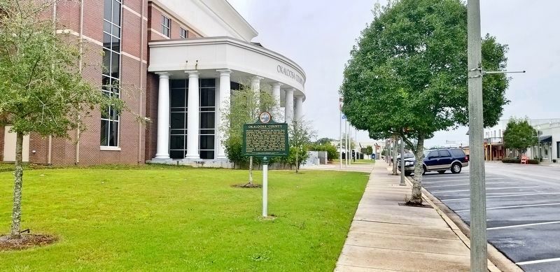 View of marker looking west on James Lee Blvd. (US-90). Click for full size. View of marker looking west on James Lee Blvd. (US-90) image. Click for full size.