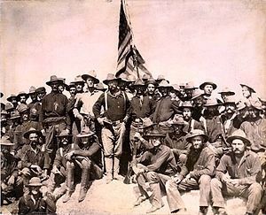 "Colonel Roosevelt and his Rough Riders at the top of the hill which they captured" image. Click for full size.