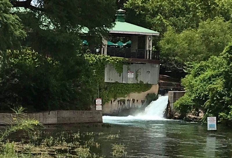 The waterfall and lake provided the power source for the mill in the 1880s. image. Click for full size.