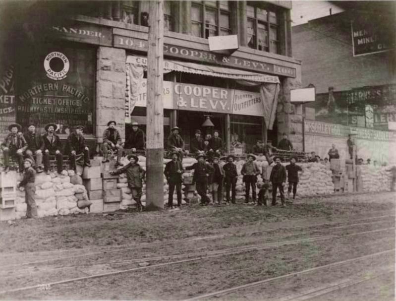 <i>Miners and supplies outside Cooper & Levy, ca. 1897</i> image. Click for full size.