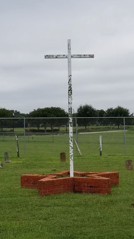 White cross at the center of the cemetery image. Click for full size.