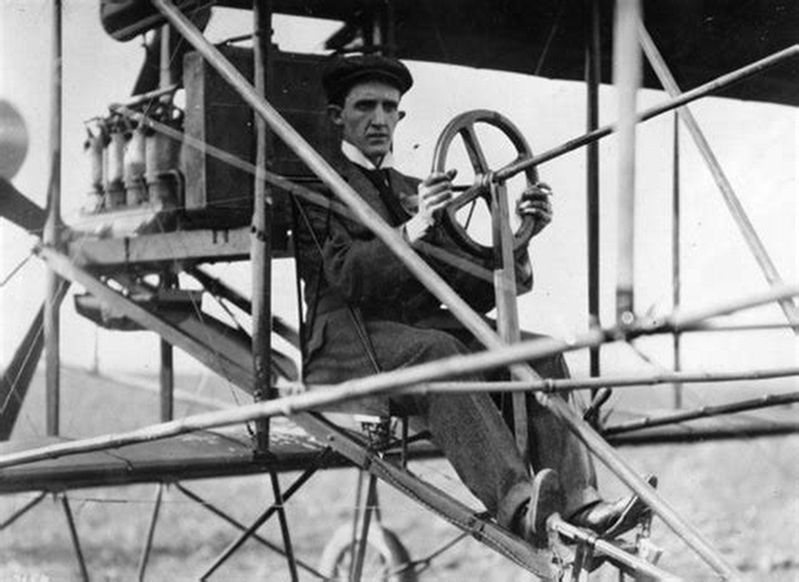 Charles K. Hamilton at the controls image. Click for full size.