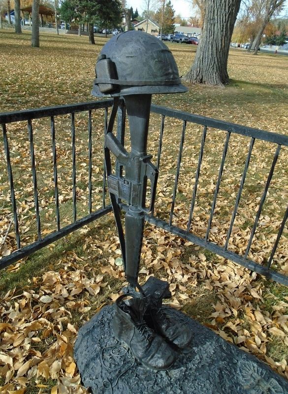 Vietnam War Memorial Boots, Rifle and Helmet Statue image. Click for full size.