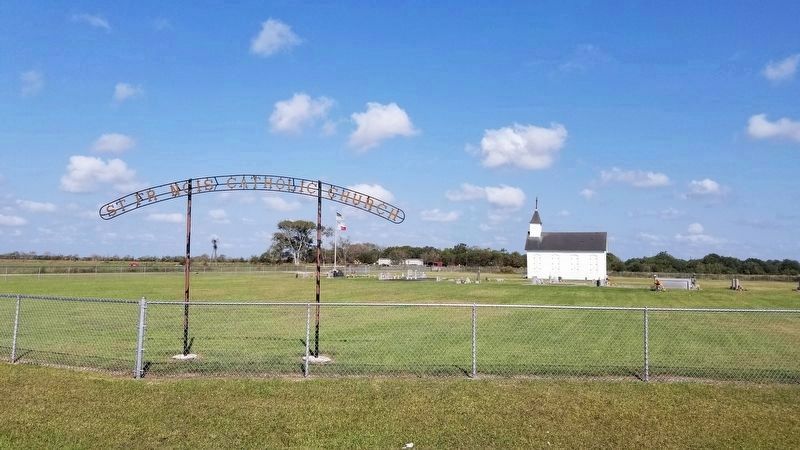 The view of St. Francis Catholic Church and cemetery from the main road (FM 521) image. Click for full size.