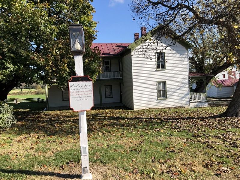 The Shenk Farmhouse and marker image. Click for full size.