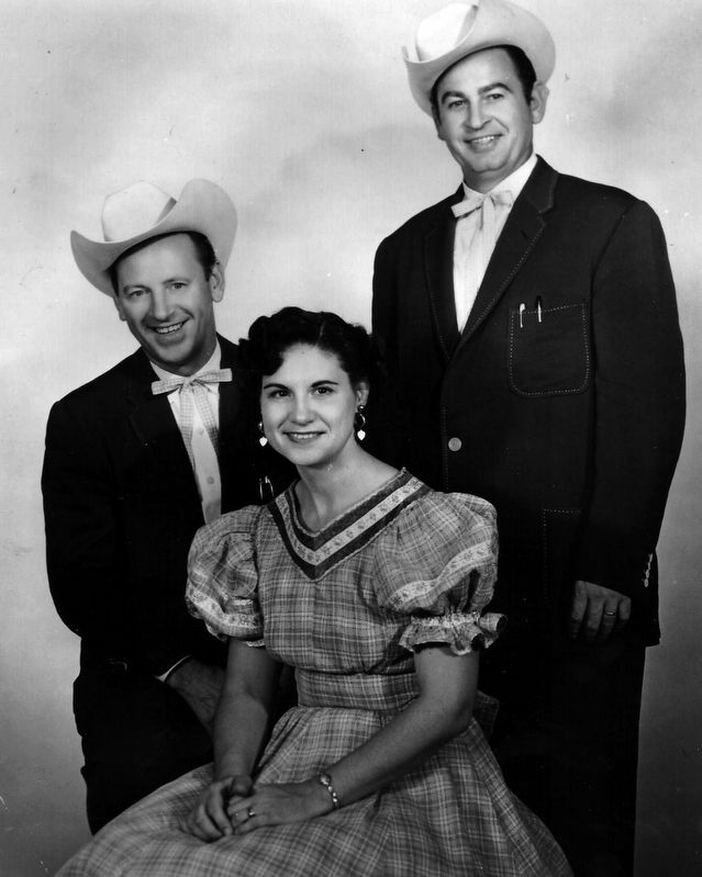 Johnnie Wright (left), Kitty Wells (center) and Jack Anglin (right) image. Click for full size.