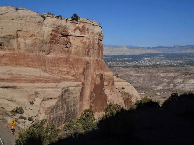 View NE toward Grand Junction from near the Upper Serpents Trail Marker image. Click for full size.