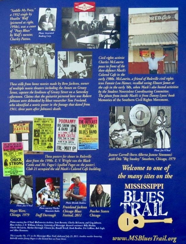 Closeup of photos on rear of marker. image. Click for full size.