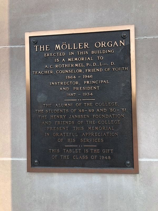 Dedication plaque for the Mller Organ to the left of the doorway image. Click for full size.