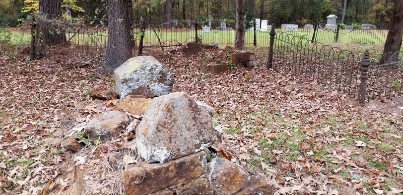 Several stone graves in the older section of the cemetery image. Click for full size.