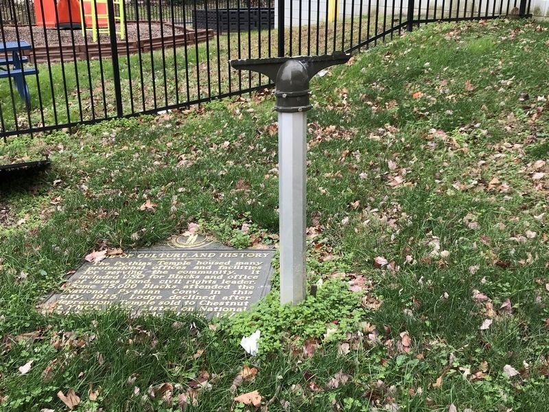 Marker on the ground next to post. image. Click for full size.
