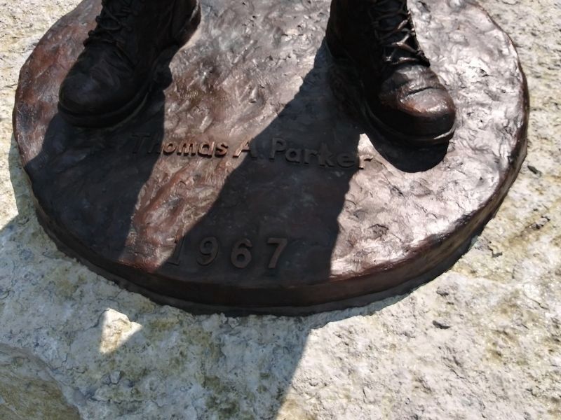 The base of the statue, showing Parker's name image. Click for full size.