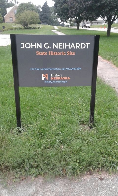 Sign at the entrance to John G. Neihardt State Historic Site. Click for full size. Sign at the entrance to John G. Neihardt State Historic Site image. Click for full size.