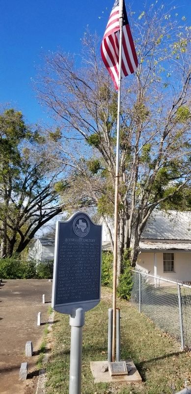 The Riverside Cemetery Marker and American flag image. Click for full size.