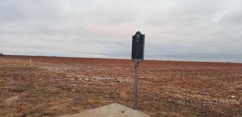 The Grasslands Marker is located near cropland that extends many miles. image. Click for full size.