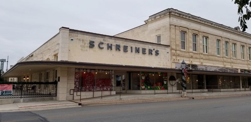 The Schreiner Wool Warehouse Marker is located on the corner column. image. Click for full size.