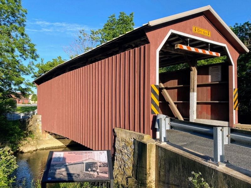 The Landis Mill Covered Bridge is visible behind the marker. image. Click for full size.